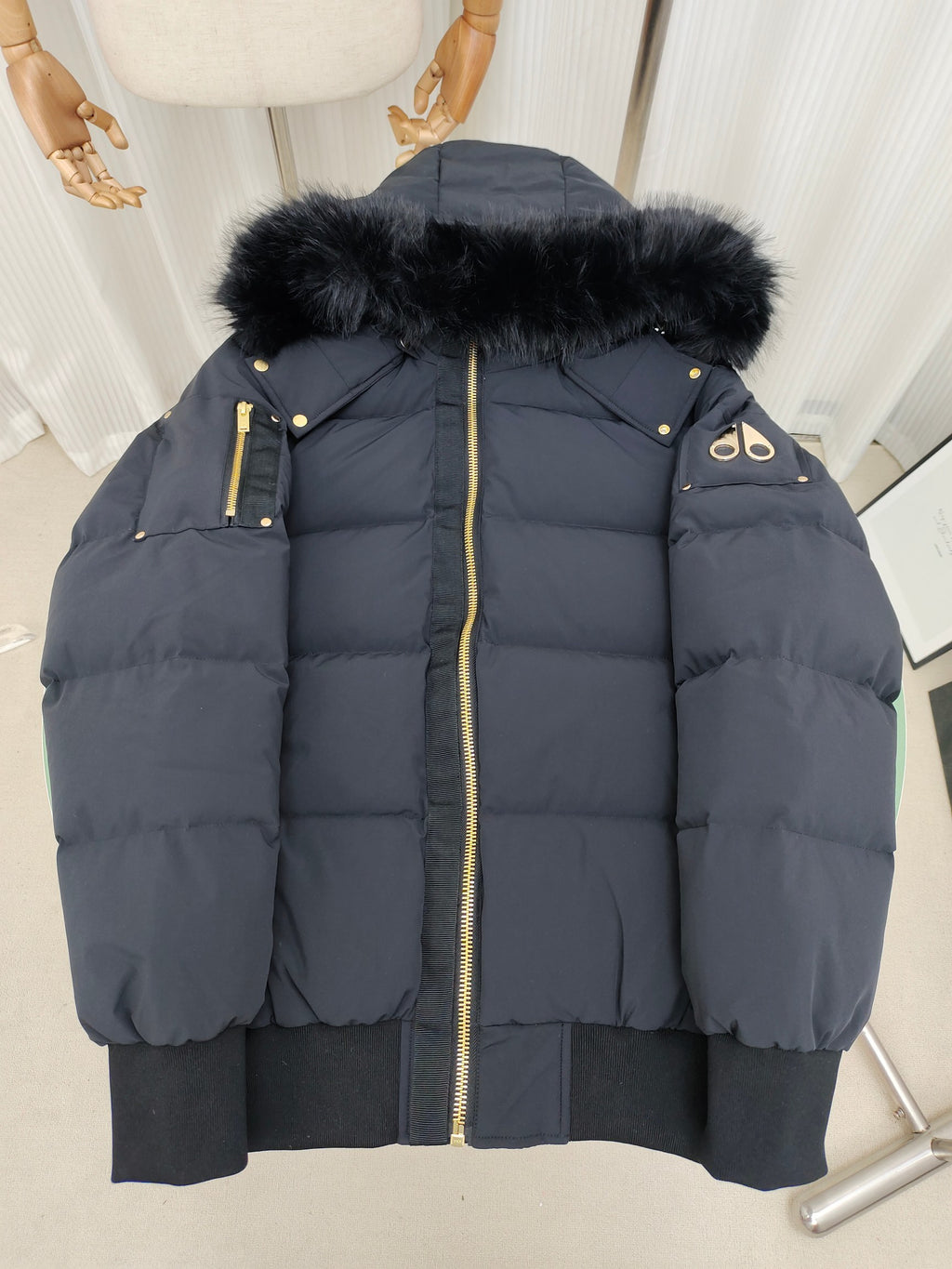 Moose Knuckles Down Bomber Jacket — Black Fur Hood & Gold Zip