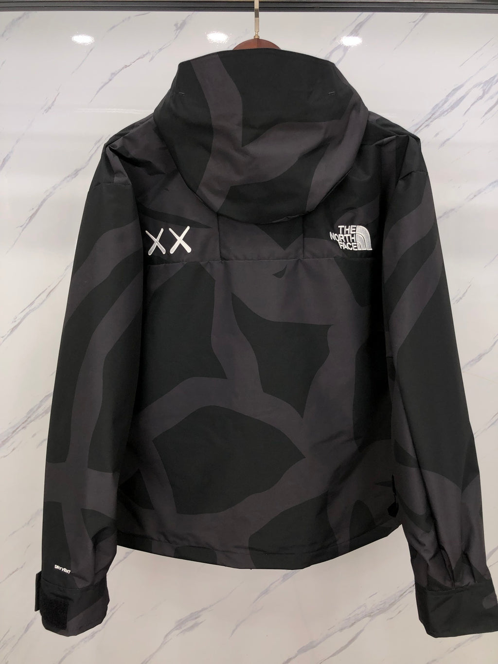 The North Face × KAWS 1990 Mountain Jacket — Black & Cream