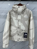 The North Face × KAWS 1990 Mountain Jacket — Black & Cream
